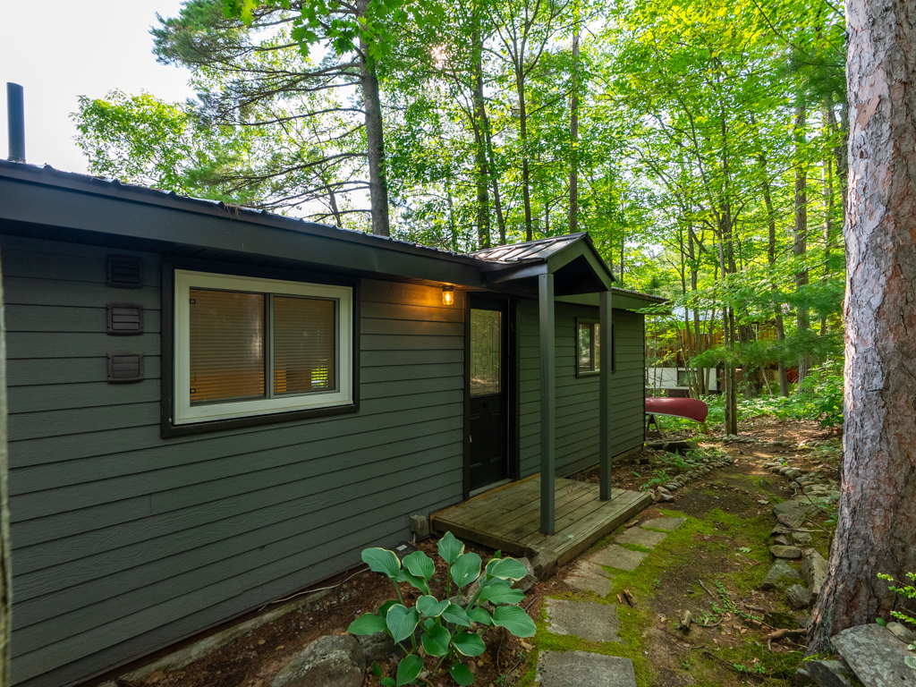 Front entrance of a big but long cottage.