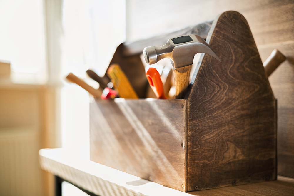 A close up of a wooden toolbox