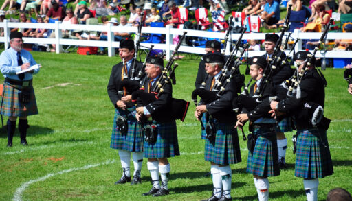 MAXVILLE, CANADA - AUGUST 1: Bagpipe band performs at the annual Glengarry Highland Games August 1, 2009 in Maxville, Ontario. August long weekend events