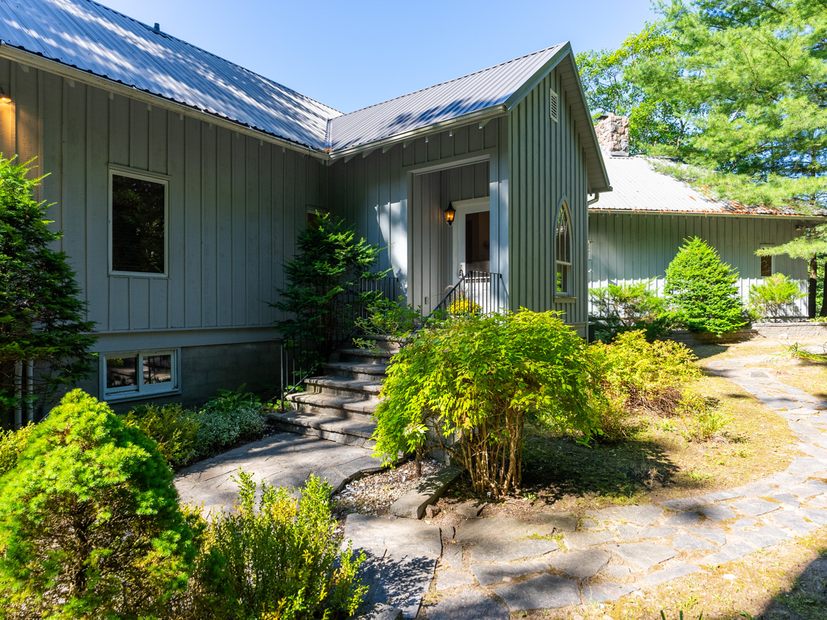 Outside view of the front door of a large cottage.