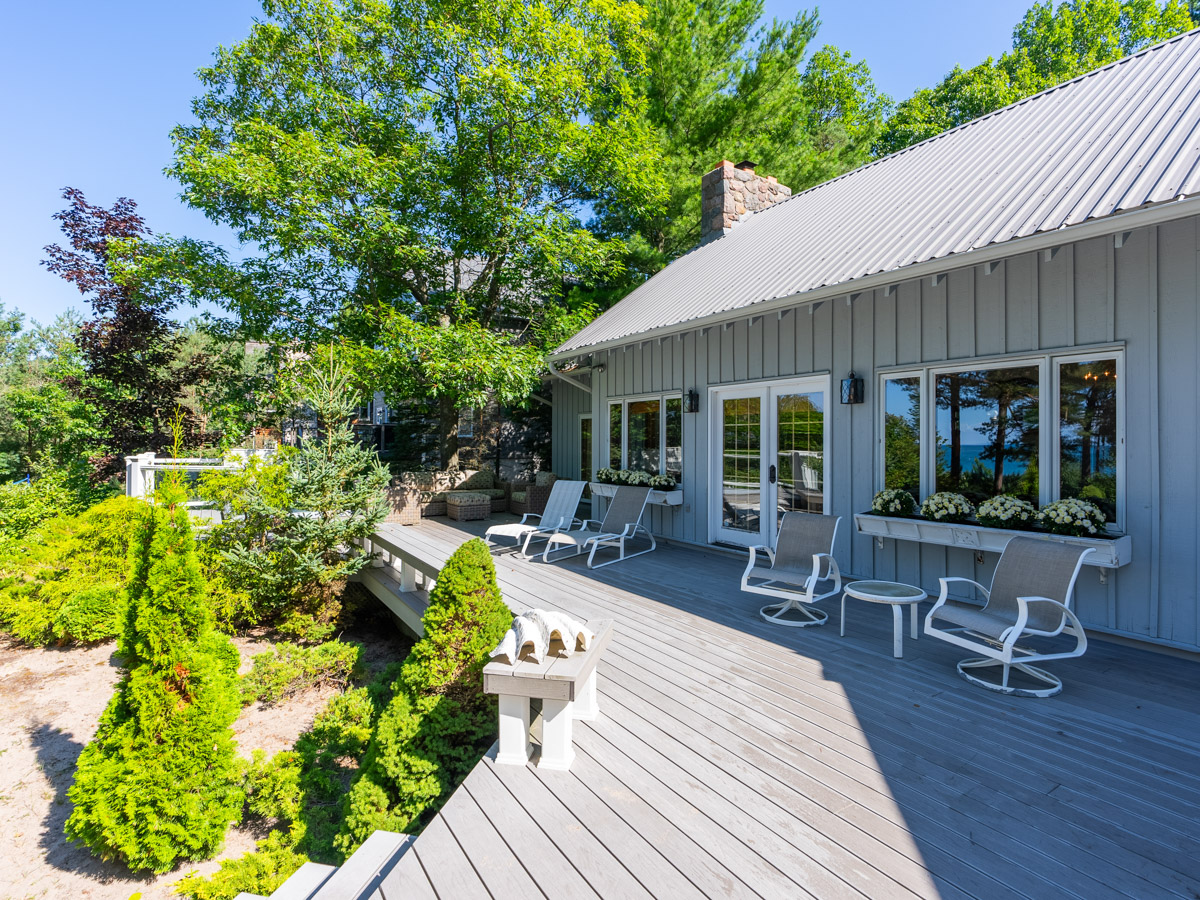 A large back deck with lots of ceiling.