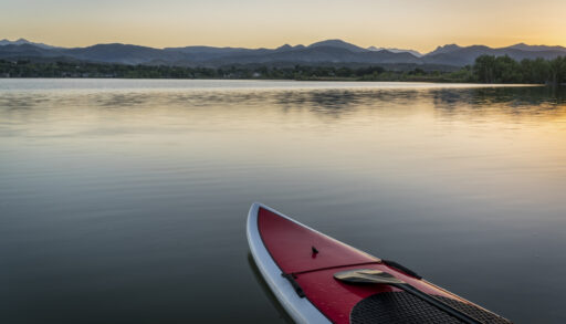 Paddleboard alone on a lake