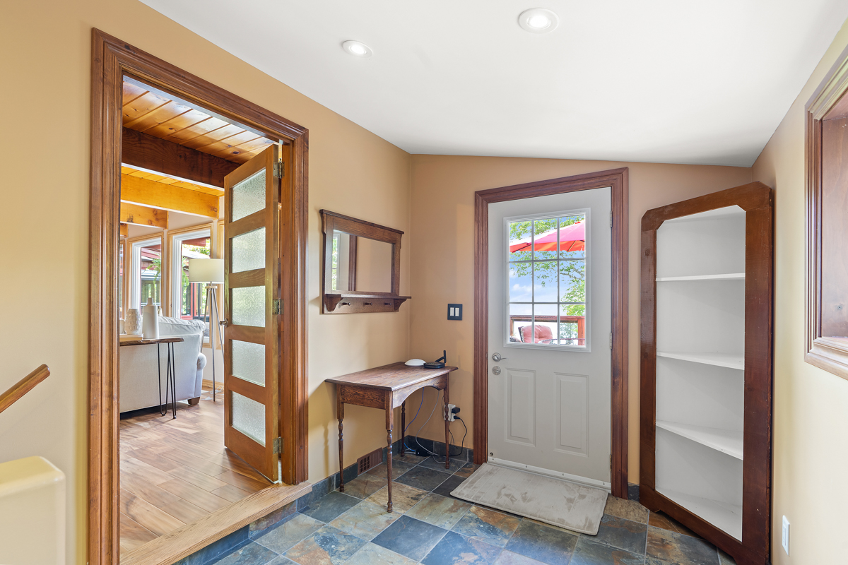 A back door leading out to a deck.