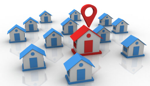 blue houses and one big red house in the middle