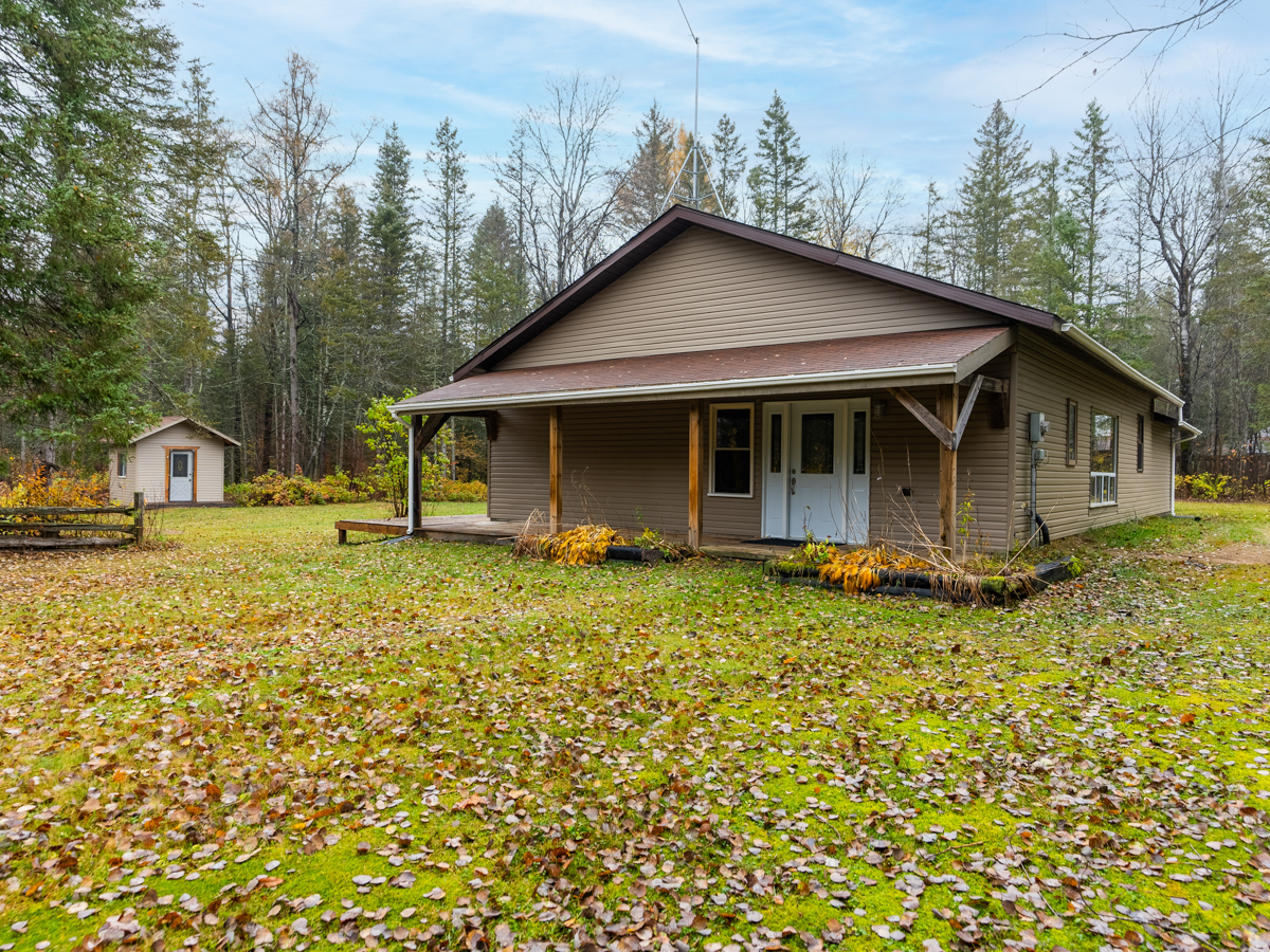 The front of a rural, bungalow-style home.