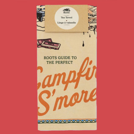 Folded tea towel that says "Roots guide to the perfect campfire s'mores"