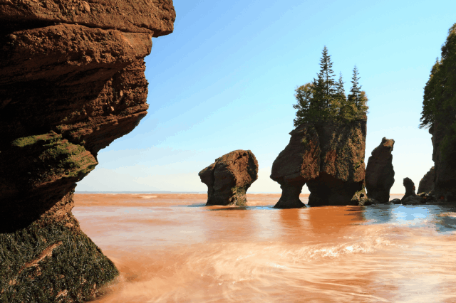 Bay of Fundy before and after tide comes in.