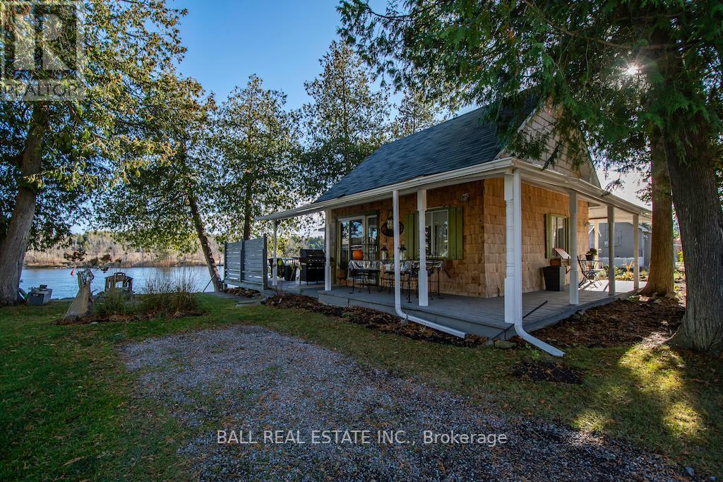 Exterior of cottage facing river