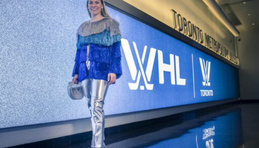 natalie spooner in a blue and silver outfit