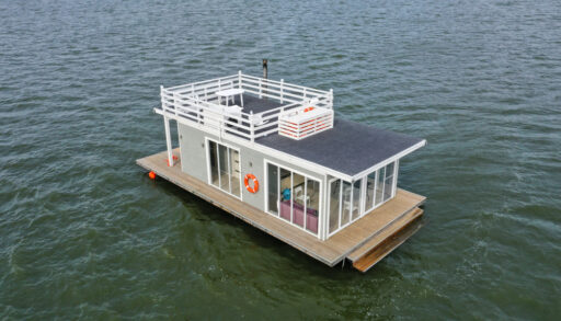 A floating accommodation floats in the water.