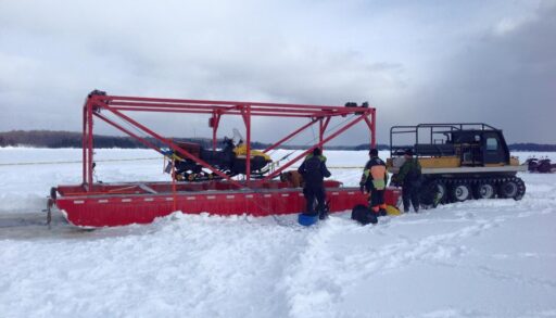 Snowmobile on a Frozen Lake