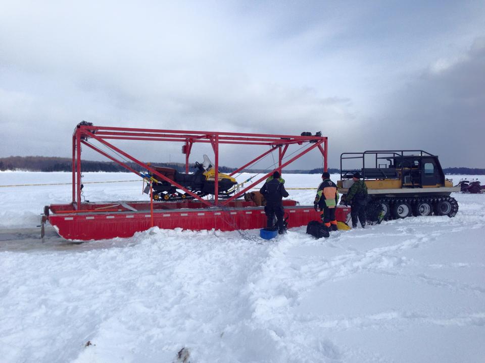 Snowmobile on a Frozen Lake