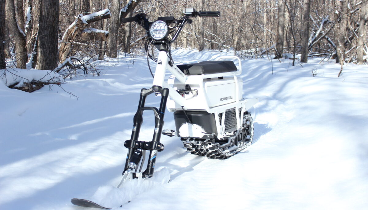 a photo of a white moonbike
