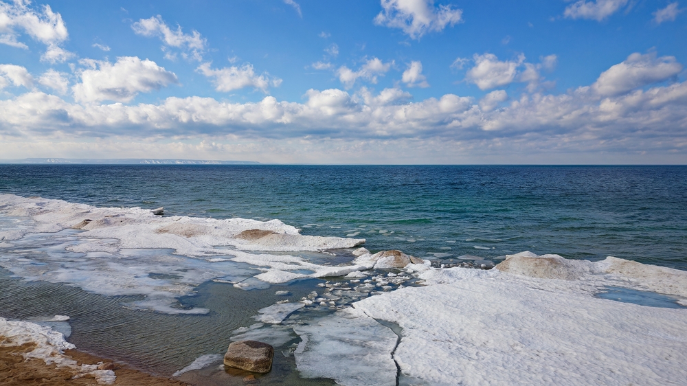 Drone shot of Georgian Bay Ice Pack Breaking Up and Melting in February when unseasonably warm