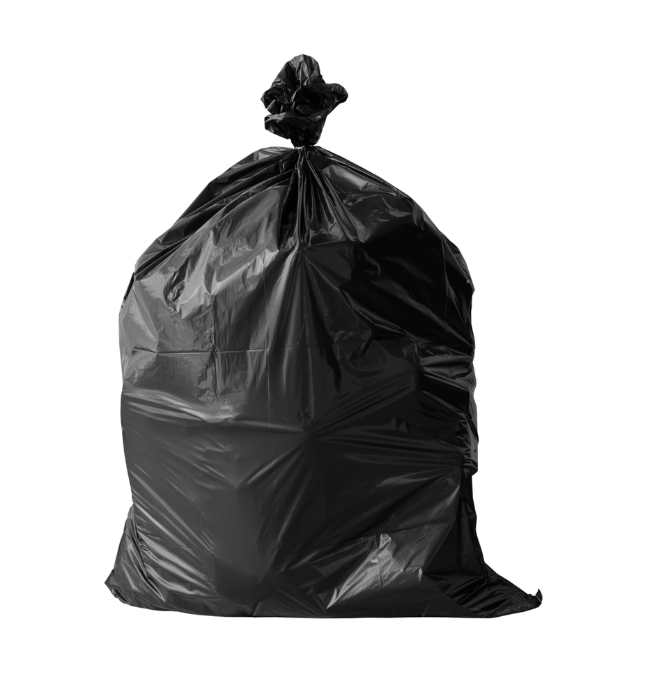 A black plastic garbage bag against a white background