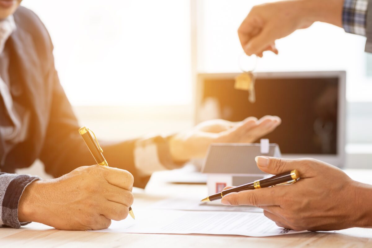 two hands and paperwork