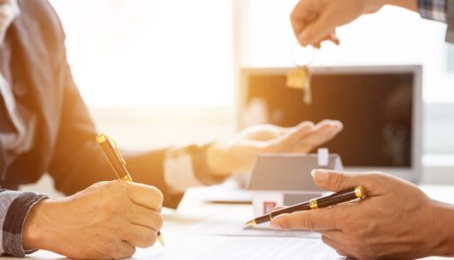 two hands and paperwork