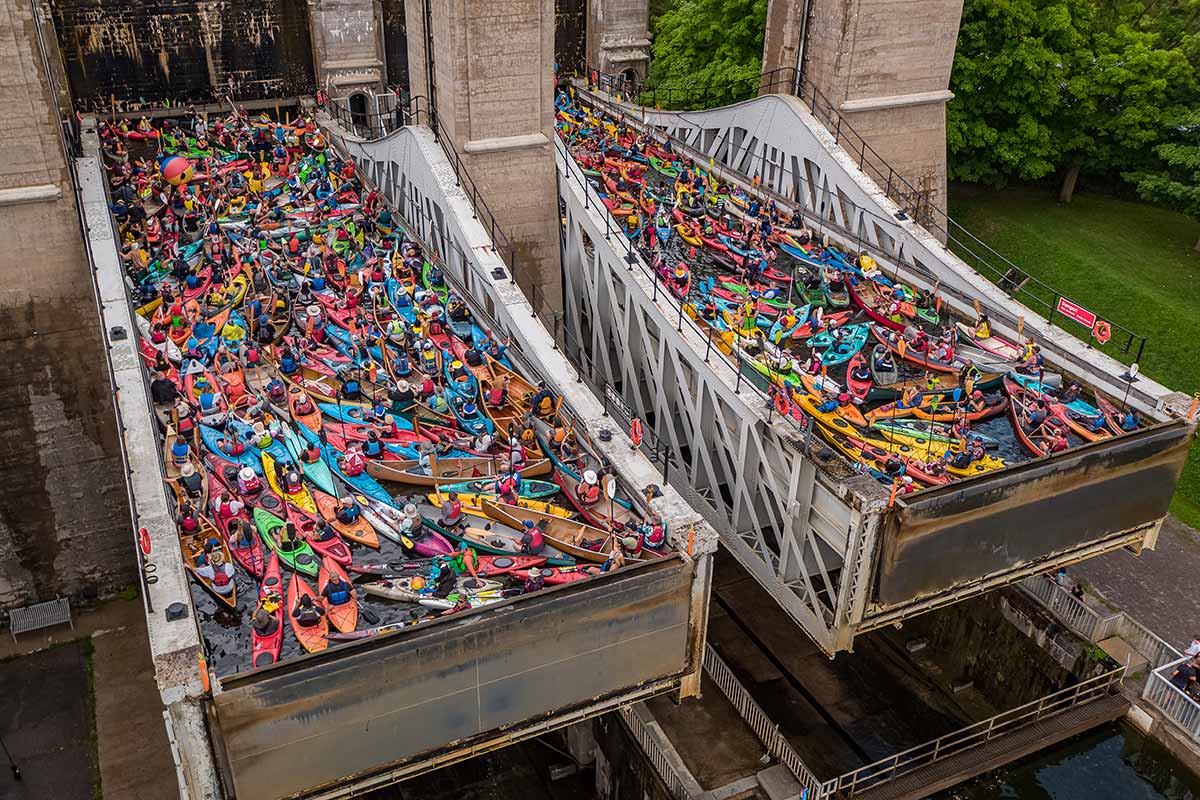 people in kayaks and canoes on the trent-severn waterway in peterborough