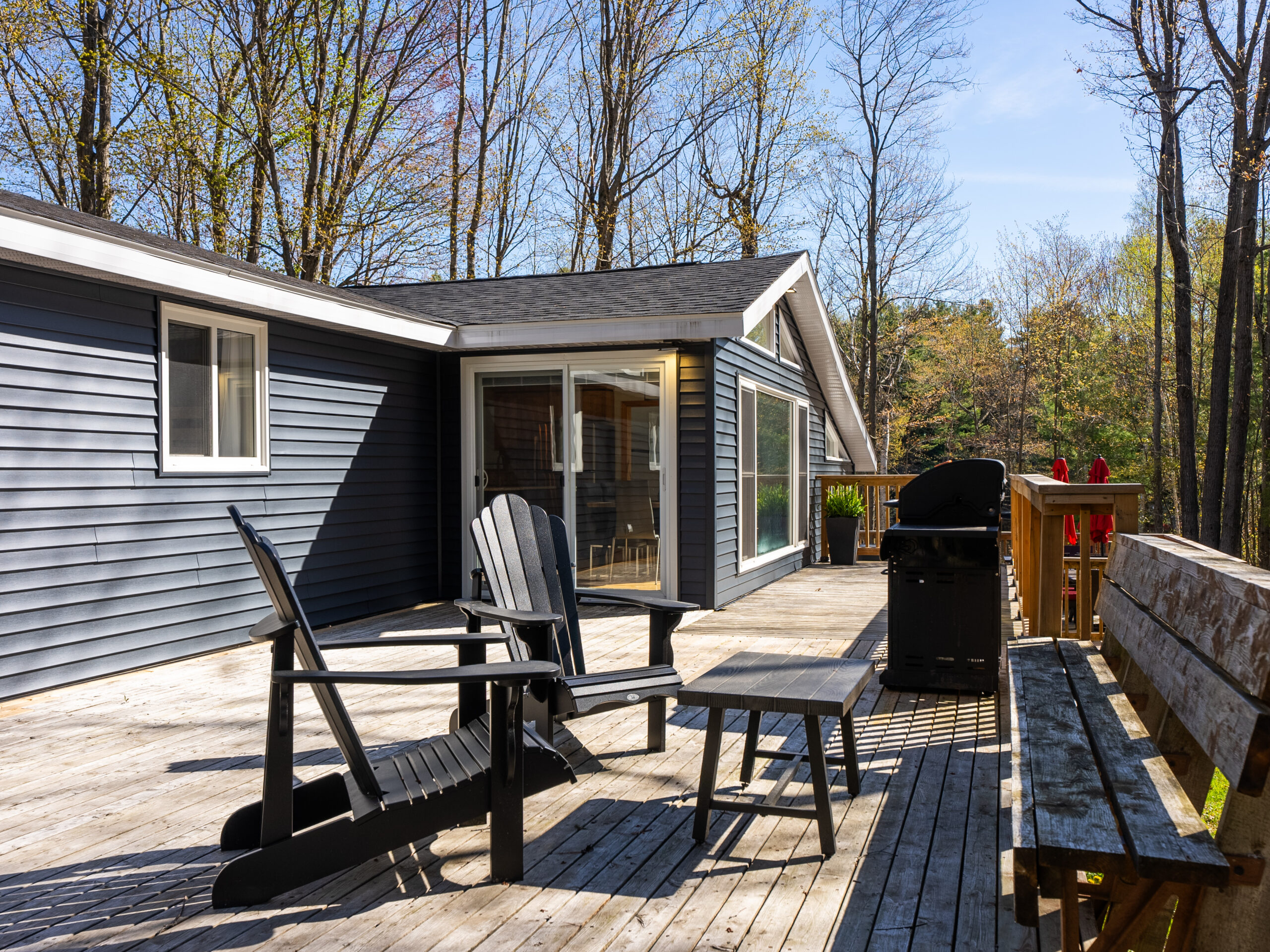 muskoka chairs on a deck