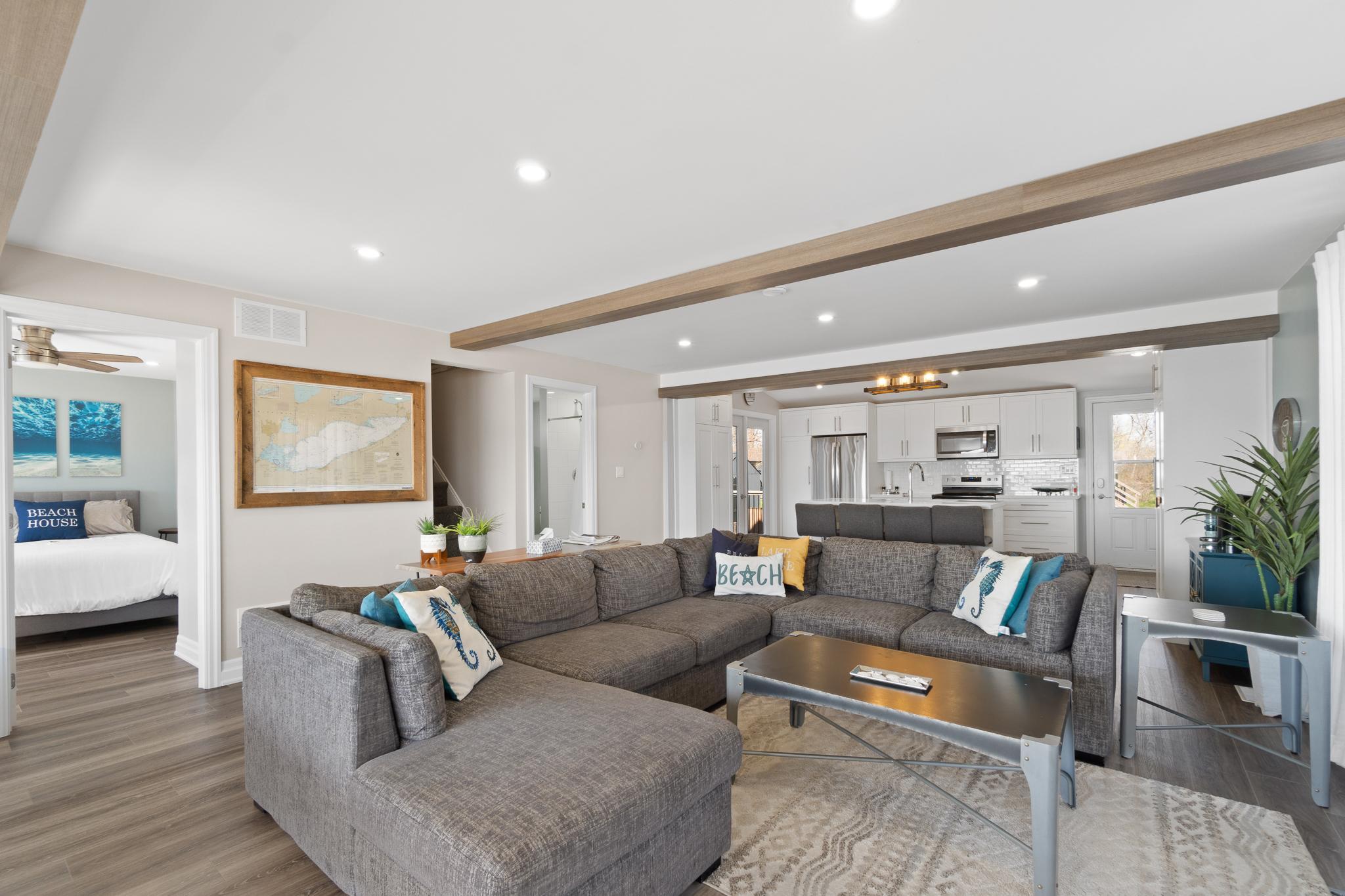 a living room with a sectional couch