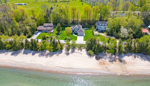 an overhead shot of a house on a beach