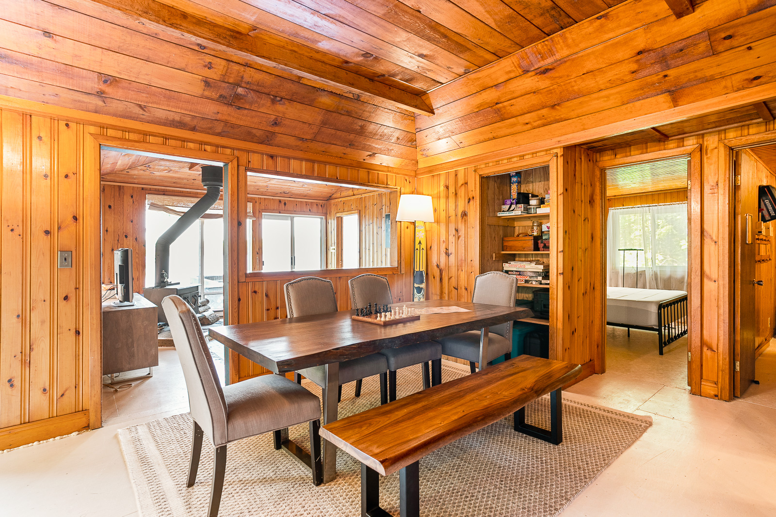 a cottage dining area with bench seating