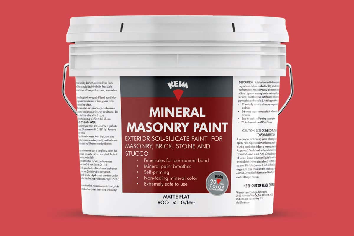 a photo of a white pail on a red background
