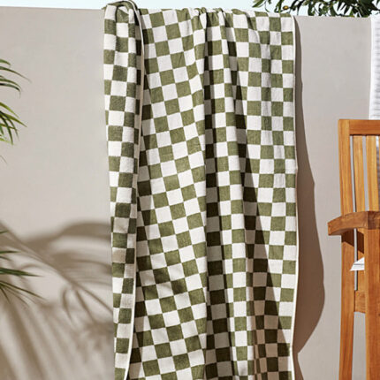 Green and white checkered towel