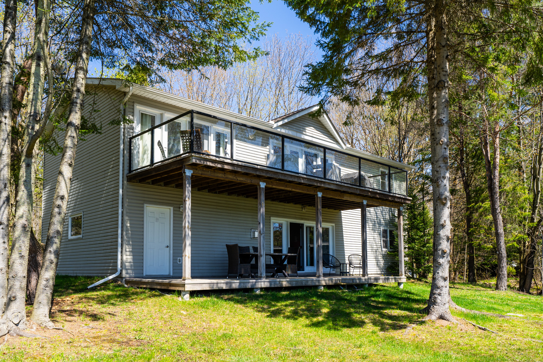 a cottage with two patios