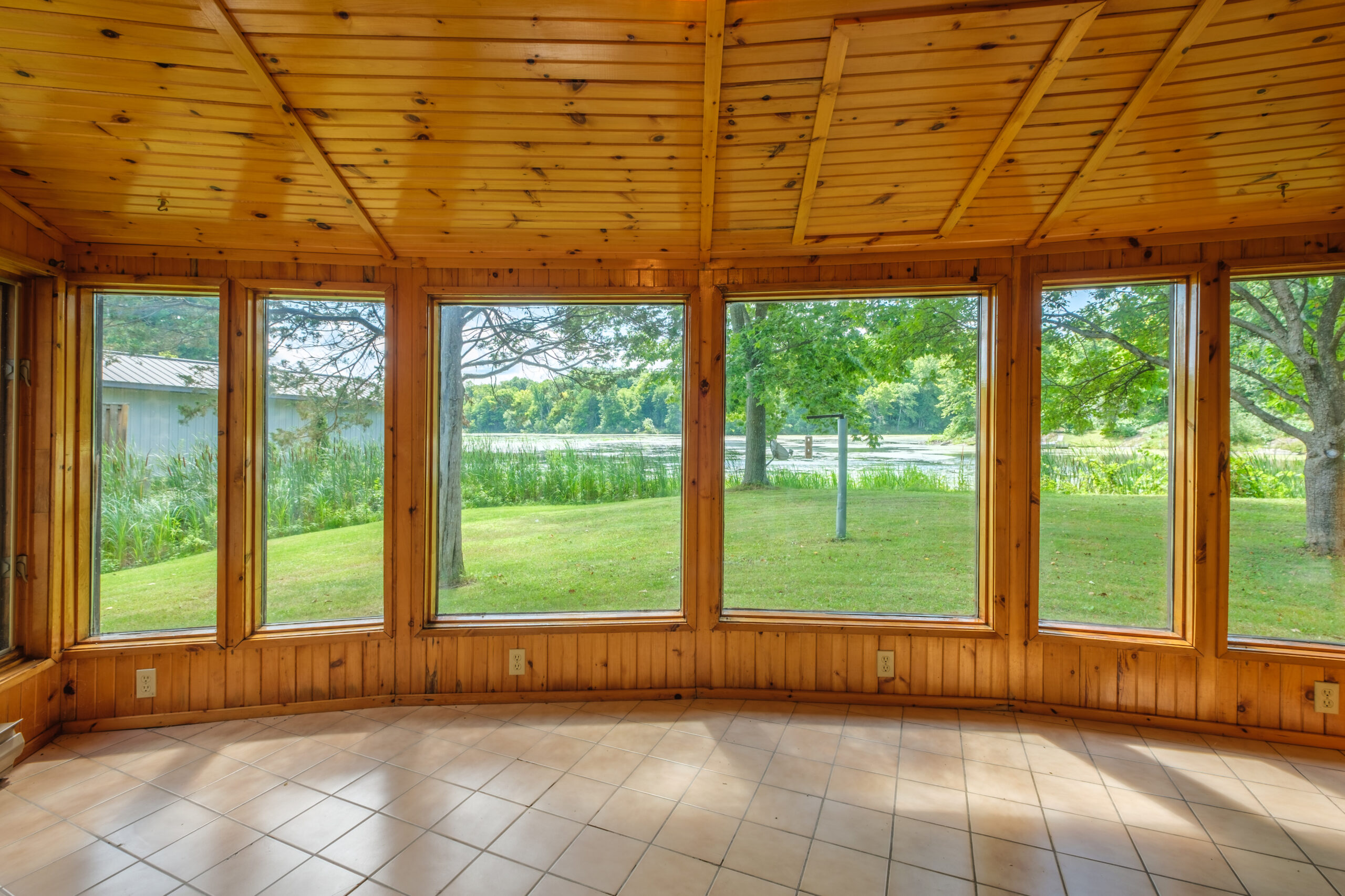 a sunroom overlooking the waterfront
