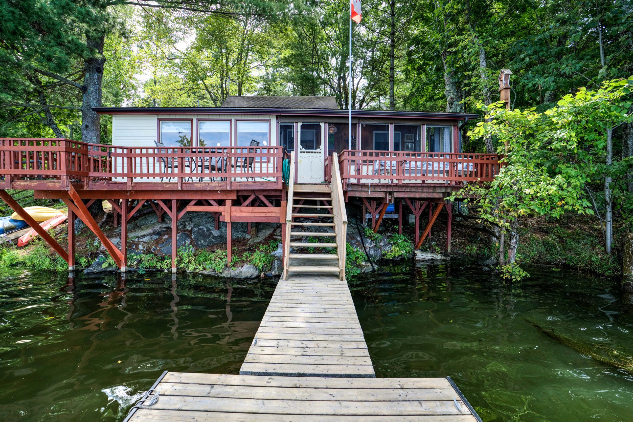From the end of the wood dock, views into the bungalow cotage