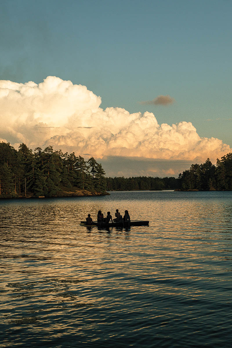 A shot of the lake where the kids sit on a swim raft