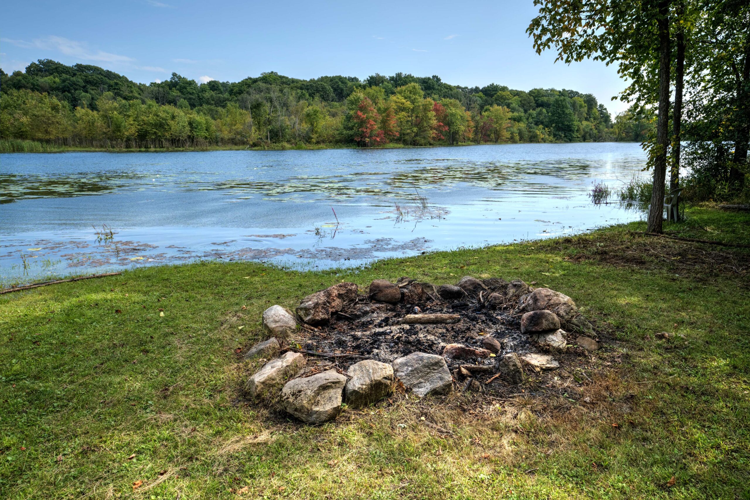 A fire pit by the water's edge