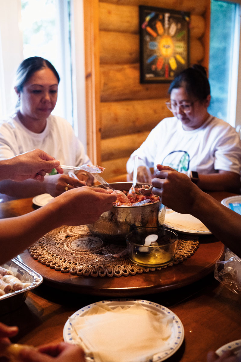 The younger clan making lumpia