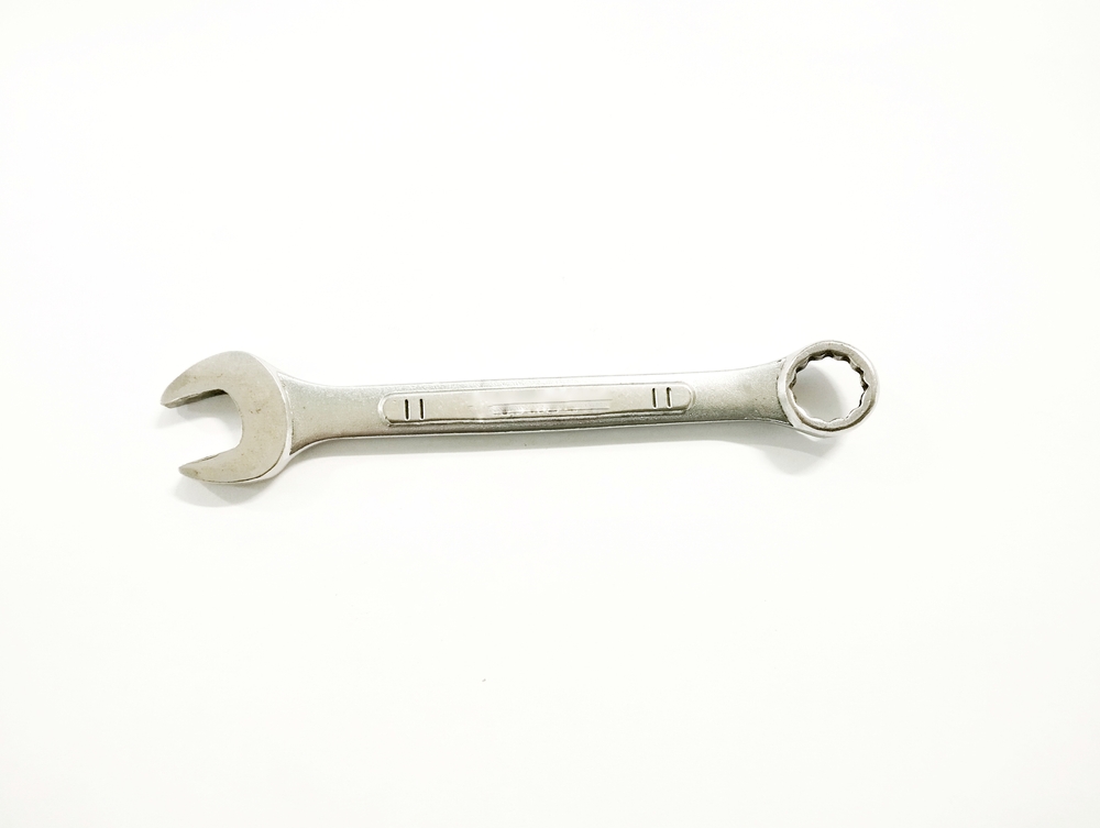 A wrench against a white background