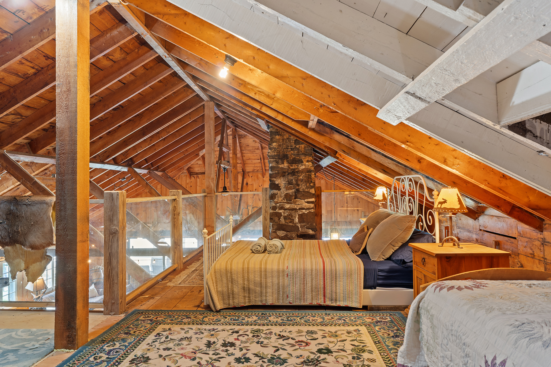 The side of a striped bed in a loft