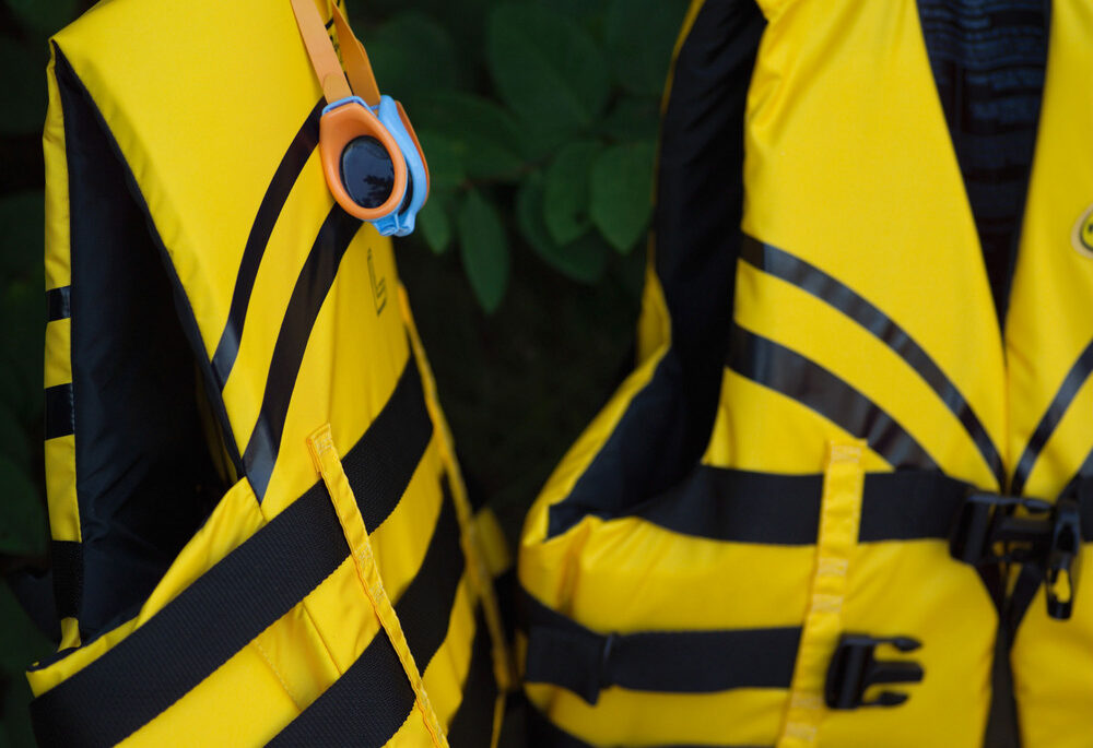 Two yellow lifejackets hanging up