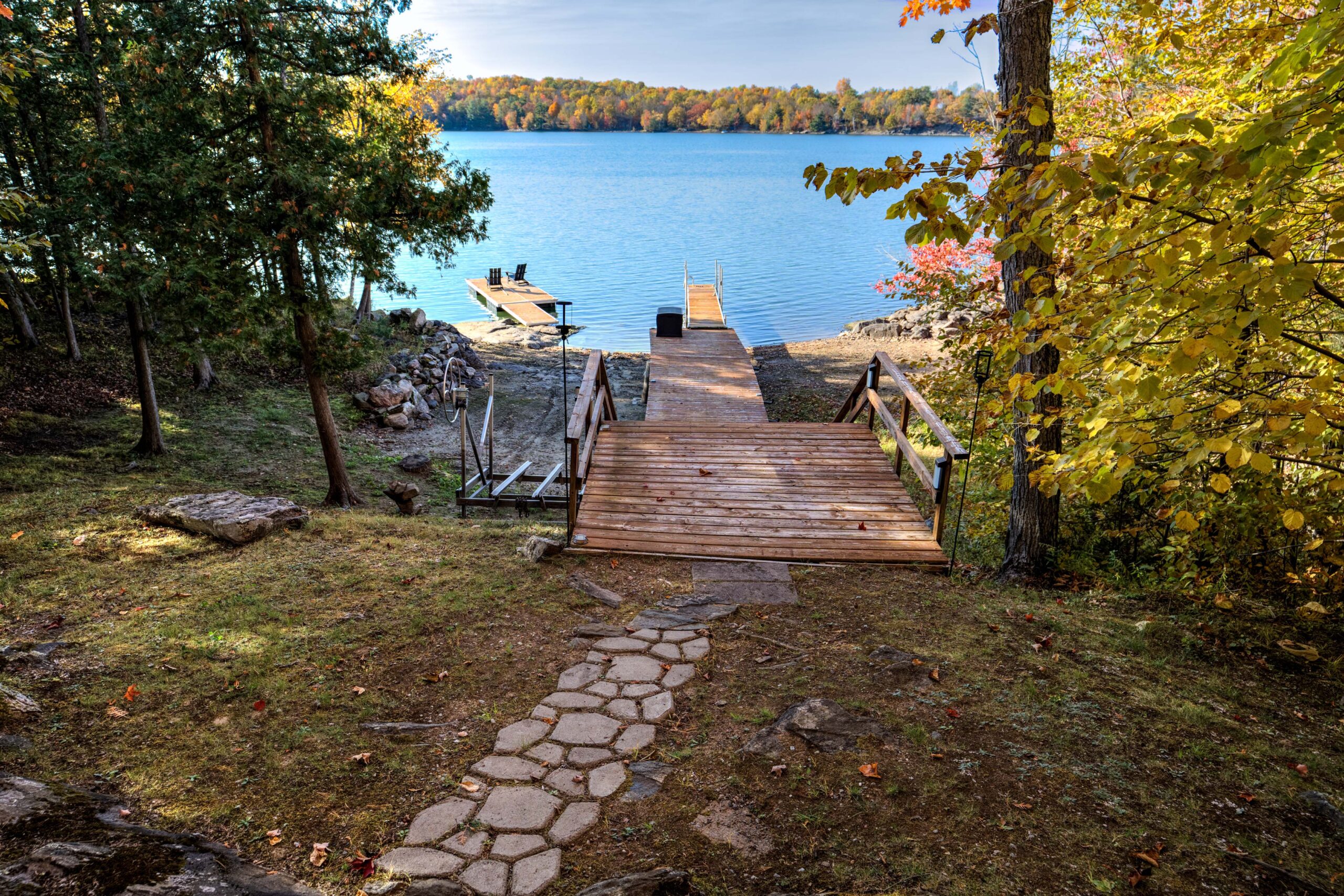 Stepping stones lead down to two docks