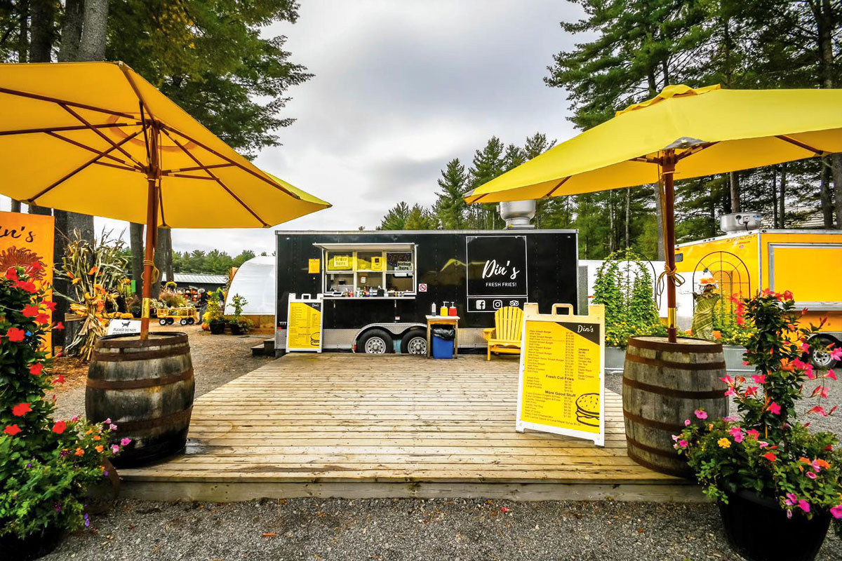 a photo of a black and yellow chip truck