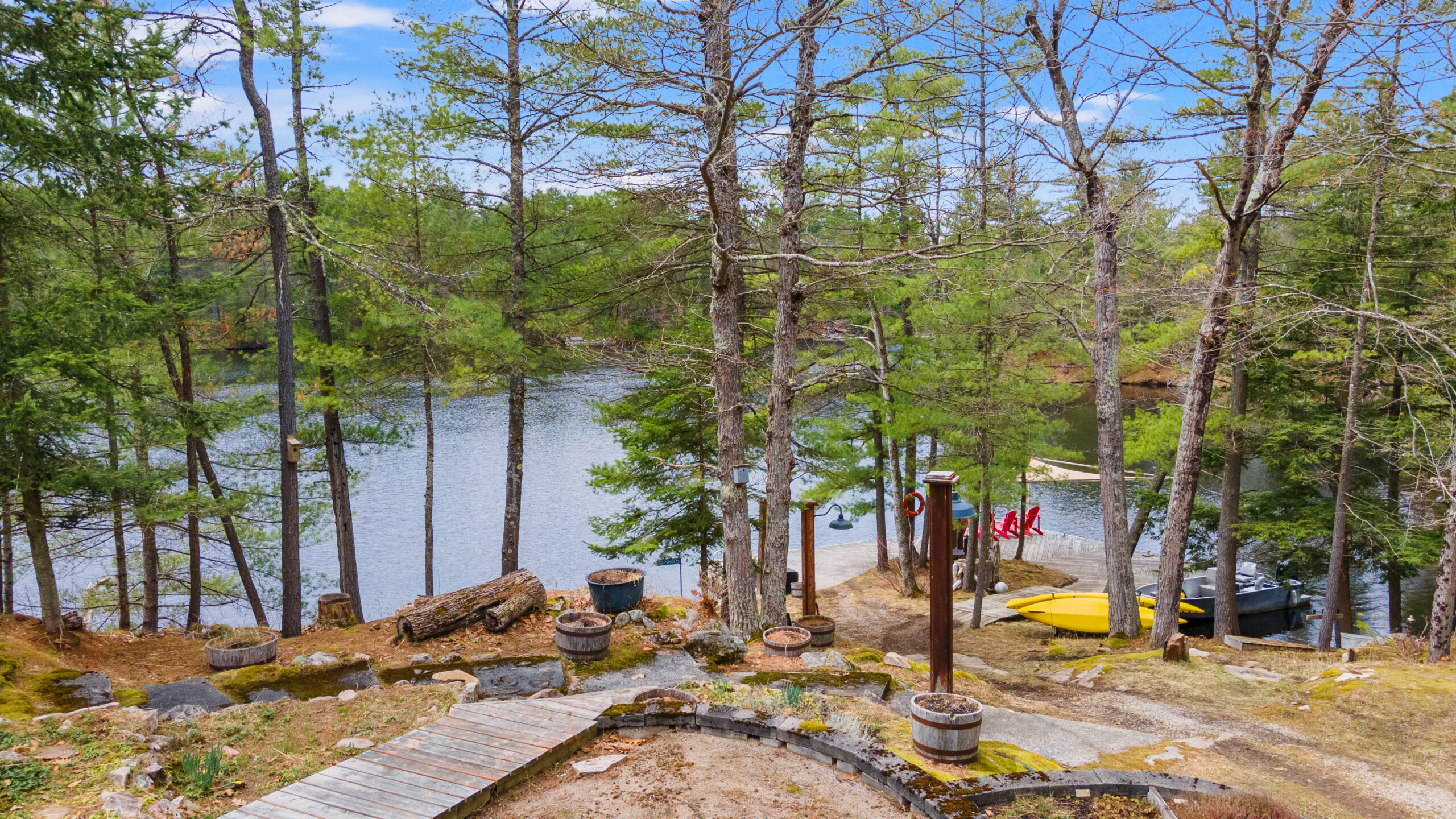 Wood steps wind downhill towards the lake