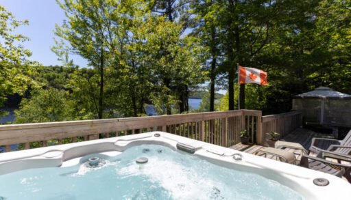 A bubbling hot top on a deck looking out into a forest