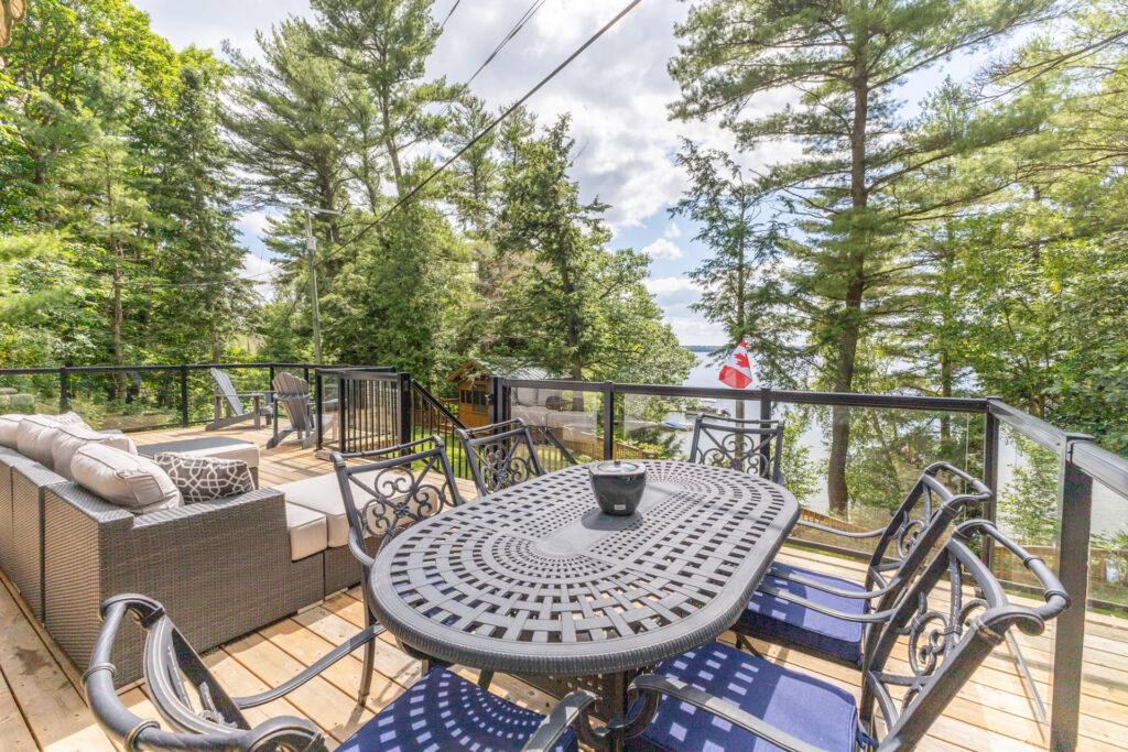 An outdoor dining table on a deck
