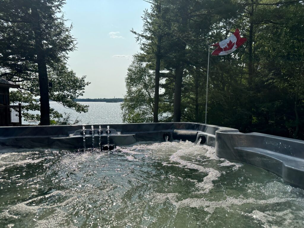 A hot tub overlooks the lake