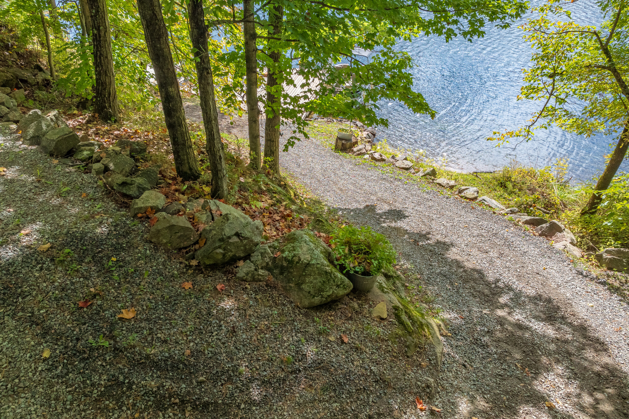 A winding path through the trees leads to your own private shoreline.