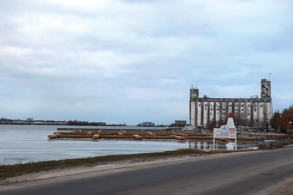 Grain terminals that read 'Collingwood Terminals Limited' on the water