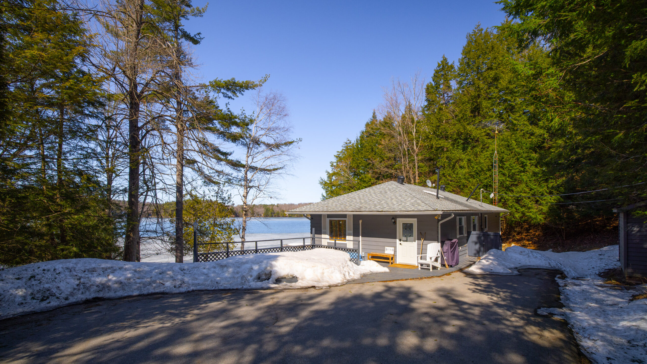 A grey-paneled cottage entrance
