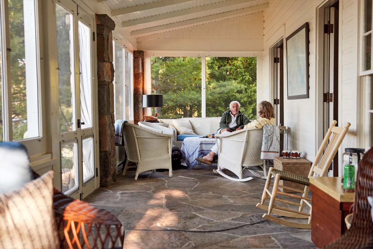 Bryn Turnbull's parents sit on the screened porch