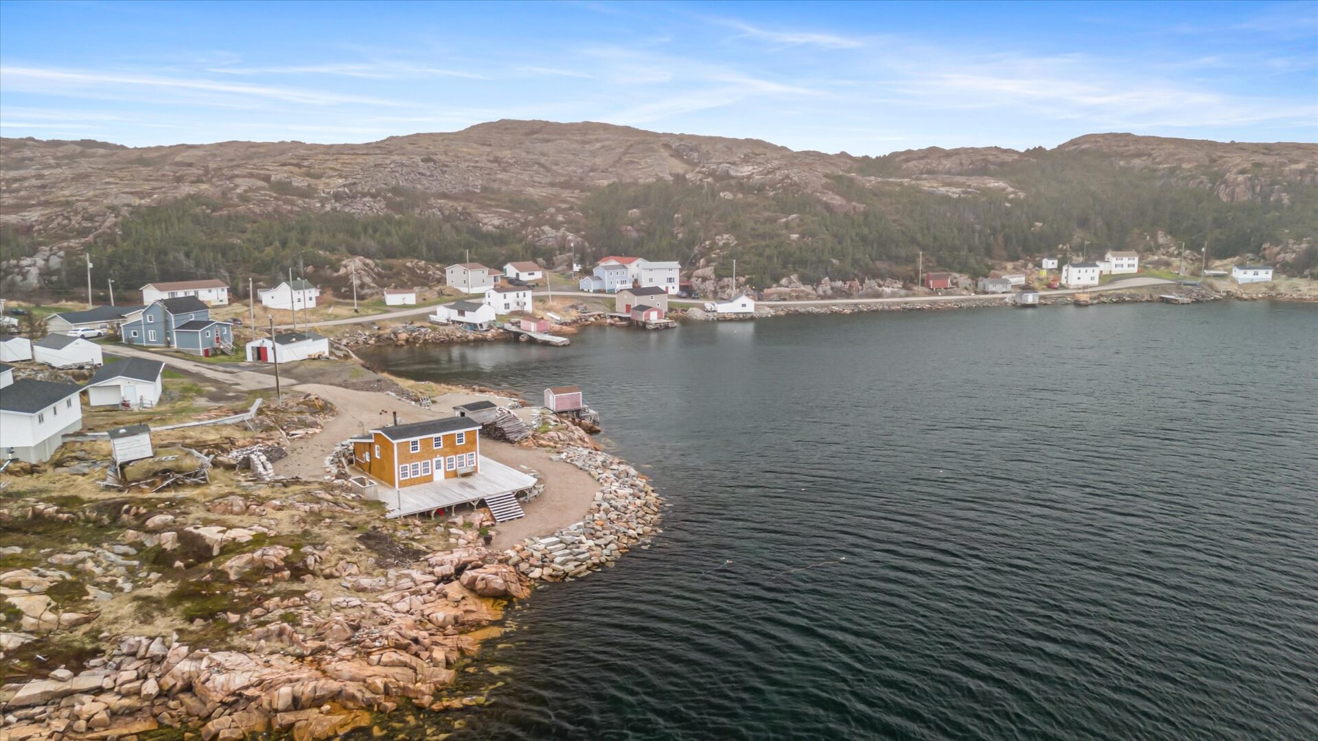 Aerial photo showing the home’s position within Deep Bay’s scenic shoreline