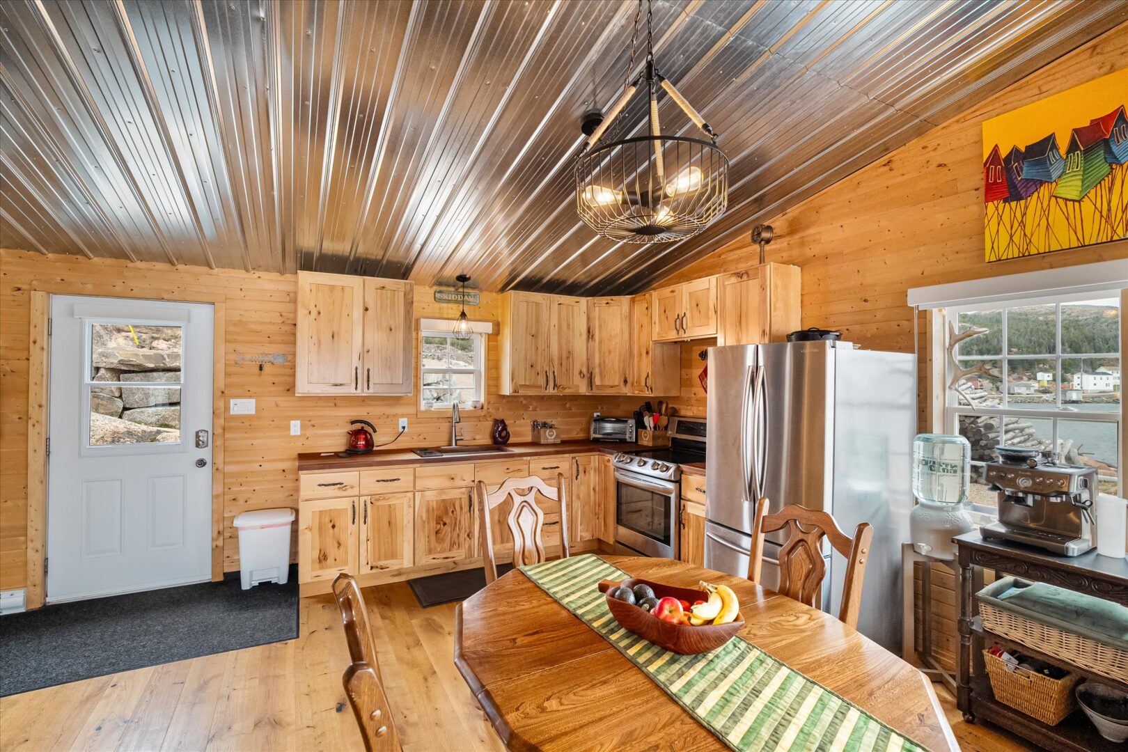 Water views from the dining area with rustic lighting and decor
