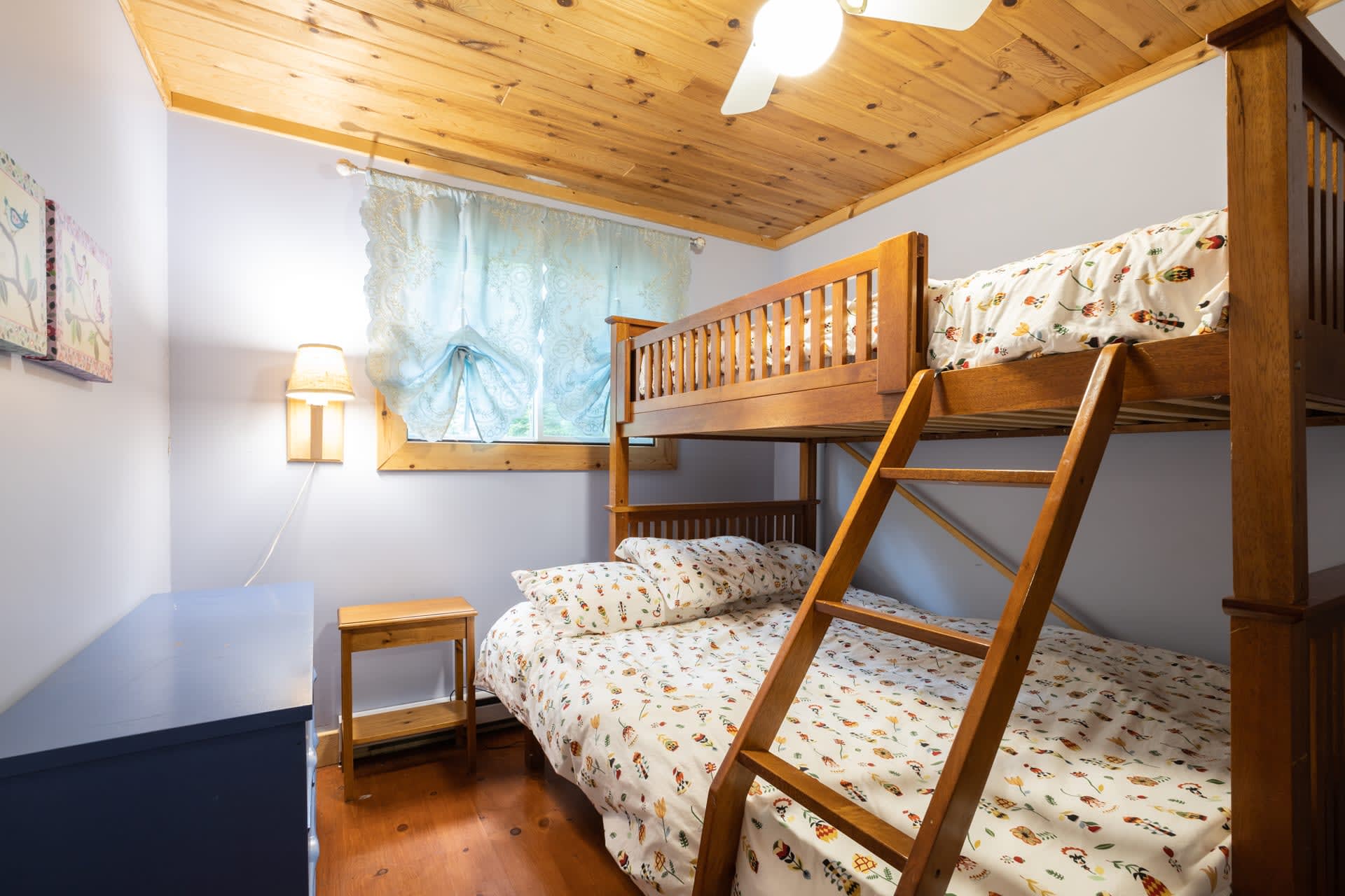 Bunk beds in a light blue room